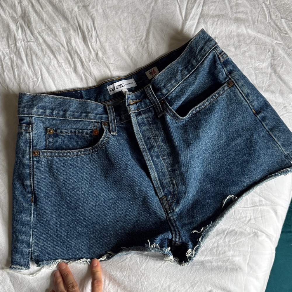 Re/Done Distressed Blue Cropped Denim Shorts
